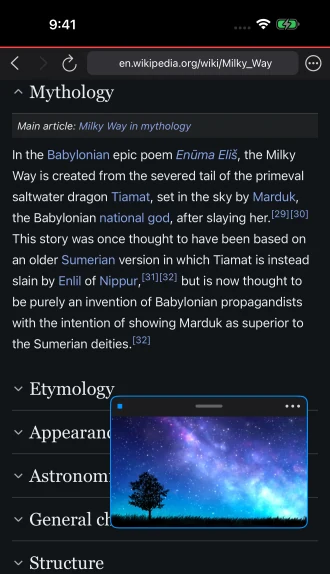 A small YouTube window floating over a Wikipedia article inside 2mado